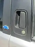 Exterior door handle of a 1996 Lancia Y, recessed into the B pillar