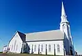 L'Étang-du-Nord church, said to have been built from shipwreck wood.