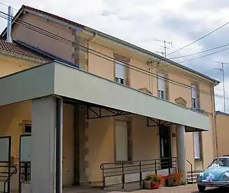 The town hall and school in Évaux-et-Ménil