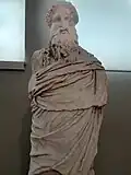 Statue of Dionysos of the Sardanapalus type, Pentelic marble. Found in the Theatre of Dionysos in Athens. Copy made in the 1st c. AD, after a Praxitelean original about 325-300 BC. National Archaeological Museum of Athens Greece