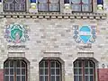 Coats of arms of Kostiantynohrad and Kremenchuk