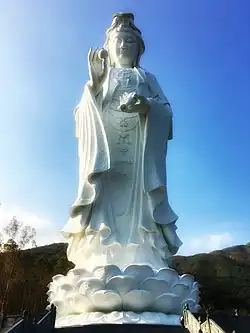 76 meter tall statue of the two-armed Cintāmaṇicakra in Tsz Shan Monastery in Hong Kong