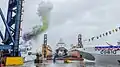 CG611 launch ceremony with CG610 to the right at pierside