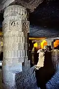 Sophisticated pillars of Cave 24 with embedded loving couples; evidence of parallel work[236]