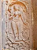 A complete upper relief on outer temple walls, lower reliefs are damaged