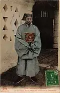 A Vietnamese mandarin wearing his ceremonial uniform.
