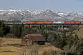 Spot Mountain seen with Two Medicine River train trestle