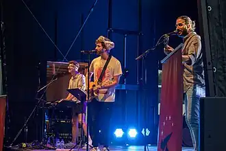 AJR performing in 2023. From left: Ryan, Jack, and Adam Met