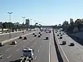 North Access freeway over National Route 9 (Argentina). The express lanes (left, all vehicles) and local lanes (right, cars and buses only) seen in the view towards the north.