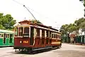 Type D tram no.&nbsp;192, built 1917, with a tramway signal box in the background
