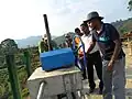 After Construction, the first opening of gates of Forebay. (Chief Executive Officer; Aruna Dheerasinghe and engineering staff members)