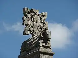 Modern copy of the Romanesque Agnus Dei topping the church of Saint Mary Salome, in Santiago de Compostela
