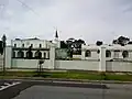 View from Dalgety Rd. Mosque (left) and its community facilities (right)