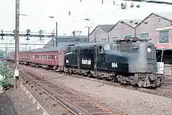 GG1 #904 westbound at Harrison, New Jersey in June 1975