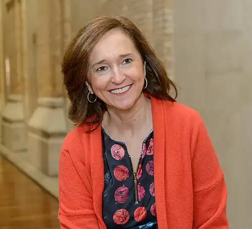 Image 17 Ana Santos Aramburo Photograph credit: Biblioteca Nacional de España Ana Santos Aramburo (born 1957) has been the director of the National Library of Spain since February&nbsp;2013. Having received a degree in geography and history from the University of Zaragoza in Spain, she has spent much of her career working at the Complutense University of Madrid, first at the library of the Faculty of Economics and Business Sciences, and later serving as deputy director of the university library. Later she served as Director of the Historical Library Marquis of Valdecilla, General Director of Libraries and Archives of the City of Madrid, and Director of Cultural Action at the National Library. This photograph of Santos shows her at the headquarters of the National Library of Spain in Madrid. More selected pictures