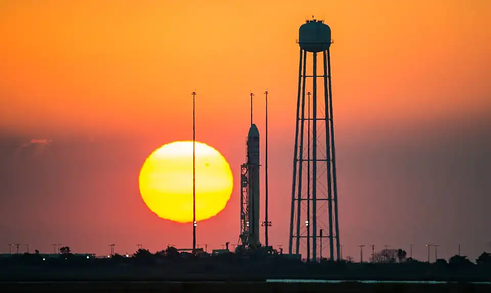 Against the disk of the rising Sun on launch day