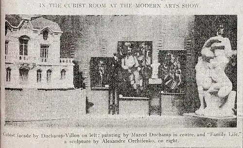 Installation shot of the Cubist room, published in the New York Tribune, February 17, 1913 (p.&nbsp;7). Left to right: Raymond Duchamp-Villon, La Maison Cubiste (Projet d'Hotel), Cubist House; Marcel Duchamp Nude (Study), Sad Young Man on a Train; Albert Gleizes, L'Homme au Balcon, Man on a Balcony; Marcel Duchamp, Nude Descending a Staircase, No. 2; Alexander Archipenko, La Vie Familiale, Family Life