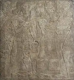 Ashurnasirpal II and a Winged Deity, Northern Iraq, Nimrud, gypseous alabaster, 9th century BC