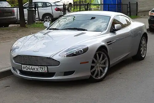Front three-quarters view of a silver coupe