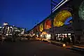 Illuminated Wipkinger Viadukt with shops (Im Viadukt).