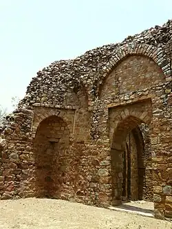 Color photograph of the ruins of a stone building