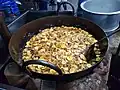 Banana chips getting deep fried at a shop in Palakkad, Kerala, India.