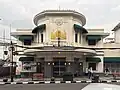 Concordia cinema&nbsp;[id] decorated with Classic Javanese kala head motif on its facade.