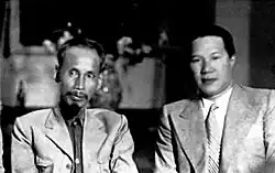 Bảo Đại (right) as the "supreme advisor" to the government of the Democratic Republic of Vietnam led by president Hồ Chí Minh (left), September 1945