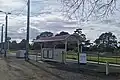 Baxter station viewed from a patch of grass near the station