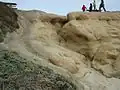 A stretch of rock eroded by wind, water, and sand