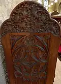 Pew end designed and commissioned by Barber