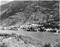 Eric A. Hegg photograph of Bennett along One Mile River