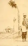 Sepiatone photo of Bowlegs in 1913