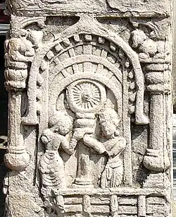 Scene on the Bodh Gaya railings (replica), representing a building