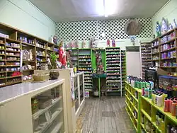 Image 17Botánicas such as this one in Jamaica Plain, Boston, cater to the Latino community and sell folk medicine alongside statues of saints, candles decorated with prayers, lucky bamboo, and other items. (from Traditional medicine)