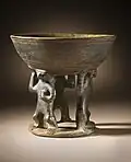 Bowl supported by 3 figures; 850–1500; resist-painted ceramic; height: 28.58&nbsp;cm (111⁄4 in.), diameter of the bowl: 19.69&nbsp;cm (73⁄4 in.); from Colombia; Los Angeles County Museum of Art (USA)