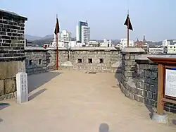 From the wall