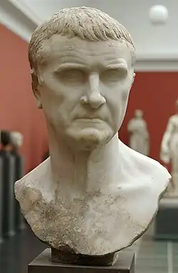 Marble portrait of a man with short hair and a severe expression