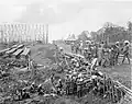 Klingalese coolies constructing a bridge at a tobacco plantation in the Dutch East-Indies (Indonesia), 1898.