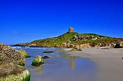 The Spanish tower of San Giovanni Sinis dominates the entire peninsula of Capo San Marco and the archaeological site of Tharros.