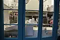 Beignets can be seen being made through the back window in the French Quarter location.[24]