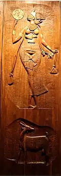 A wood carving of Oshun by Carybé