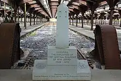 Memorial to the employees at milepost 0[25]