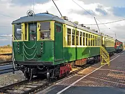 1922 vintage Chicago Rapid Transit Company 'L' cars. This car had a trolley pole in addition to contact shoes on the trucks.