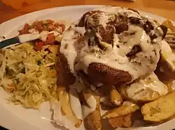 Image 8Pork chop with plantain chips (from Honduran cuisine)