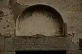 Inscription and fresco of Saint George above the western entrance