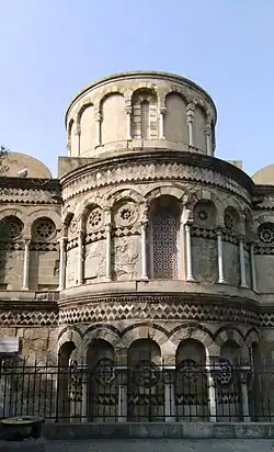 The church's well-preserved apse facing Via Garibaldi