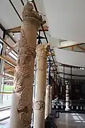 Series of columns with bacchic motifs.