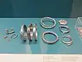 Silver armlets, a brooch and other items from the treasure