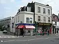 A corner shop alongside a Polish shop